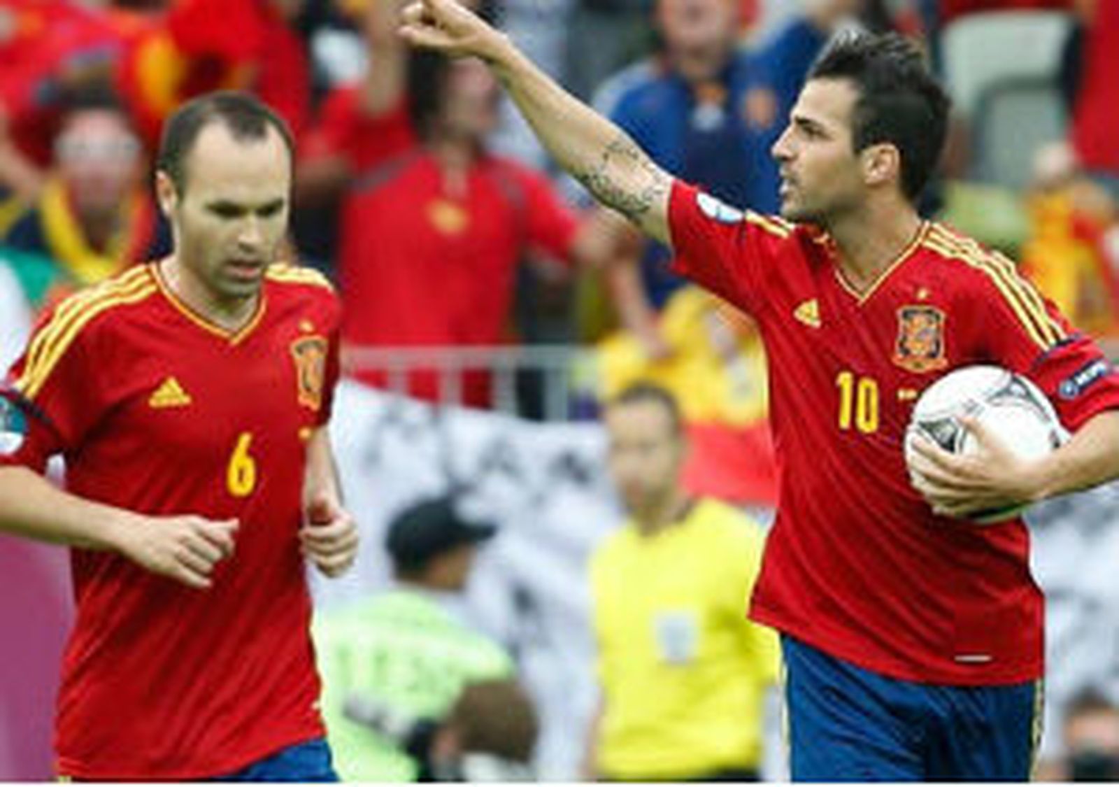 Iniesta y Cesc