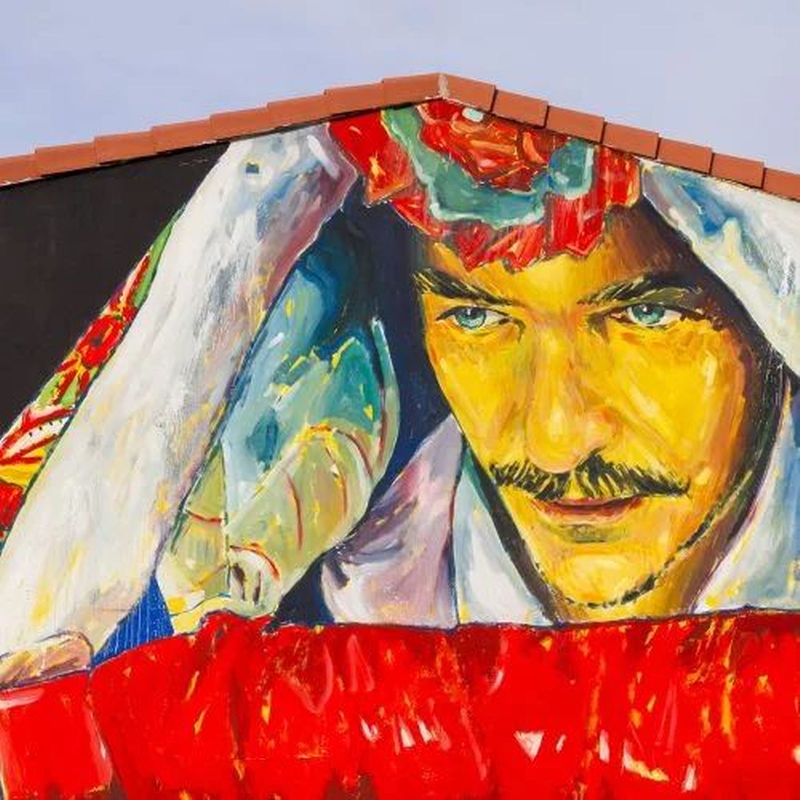 Mural sobre la Fiesta de la Vaquilla en Valdemanco, obra del artista conocido como Sortwo
