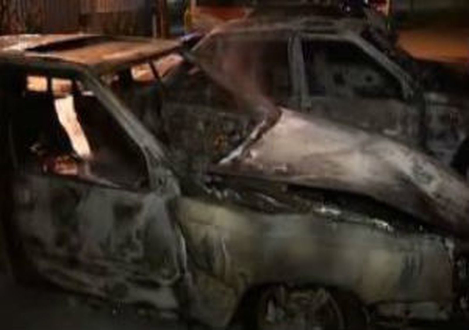 Coches quemados en los distrubios en Suecia