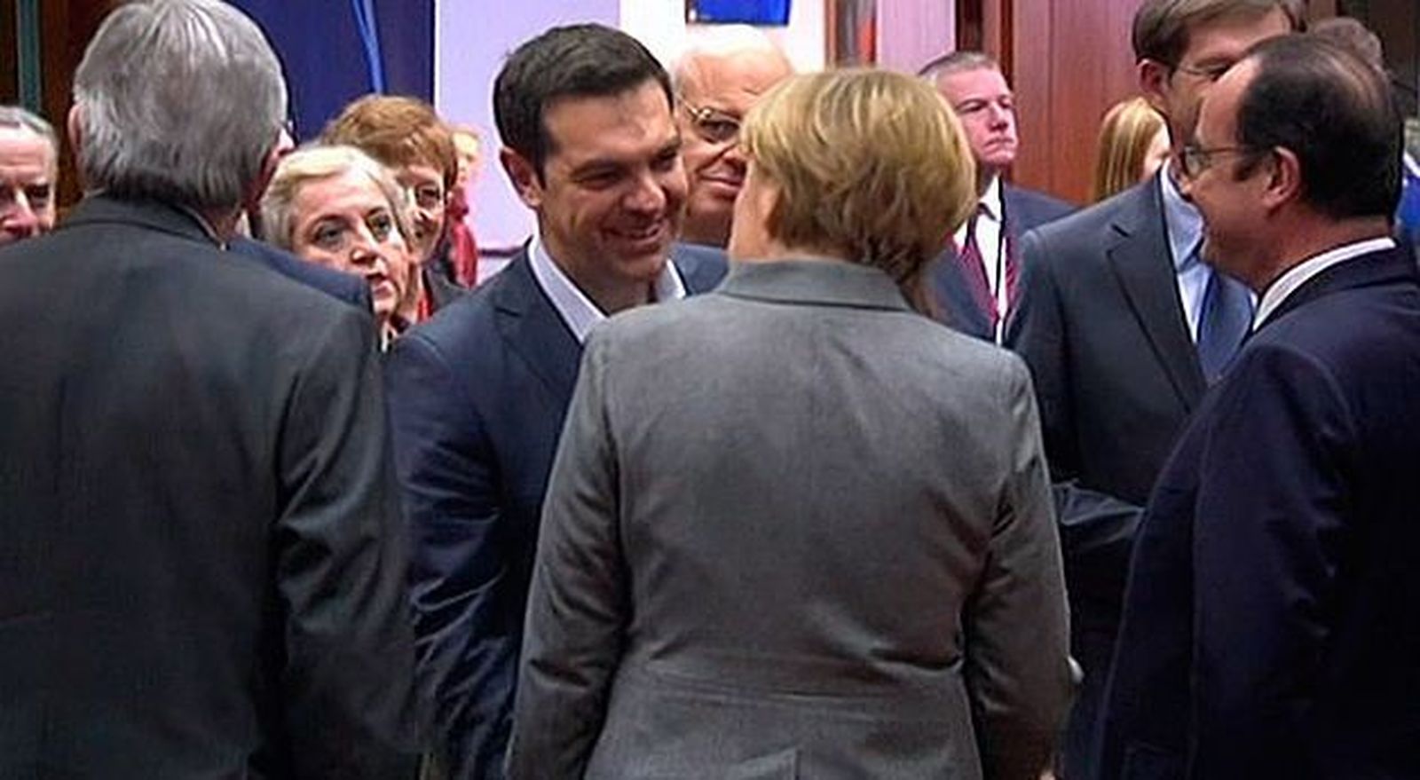 Tsipras con Merkel y Hollande en el Eurogrupo