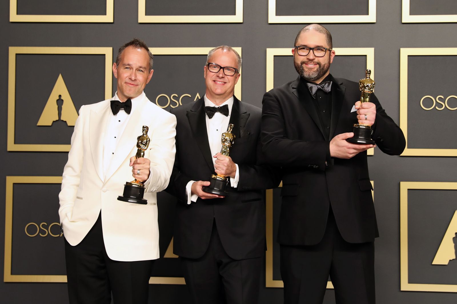 Jonas Rivera, Mark Nielsen and Josh Cooley con el Oscar a Mejor Película de Animación 'Toy Story 4'