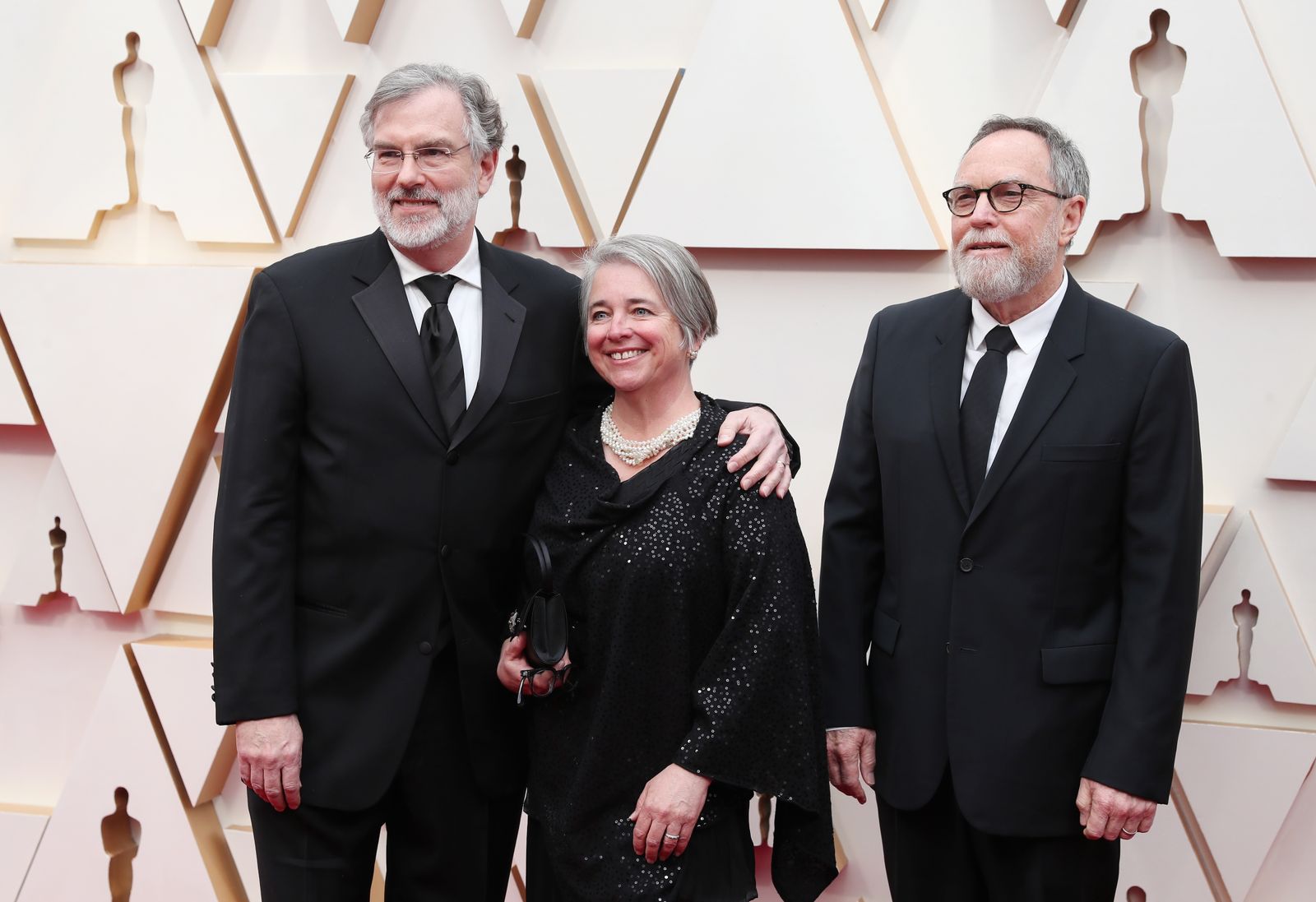 Gary Rydstrom, su acompañante y Tom Johnson