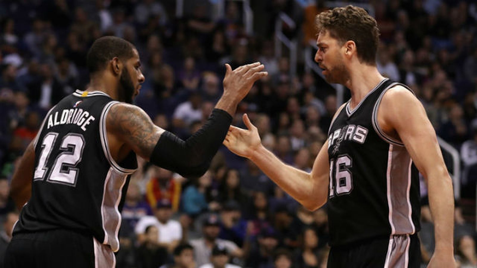 Aldridge y Pau Gasol
