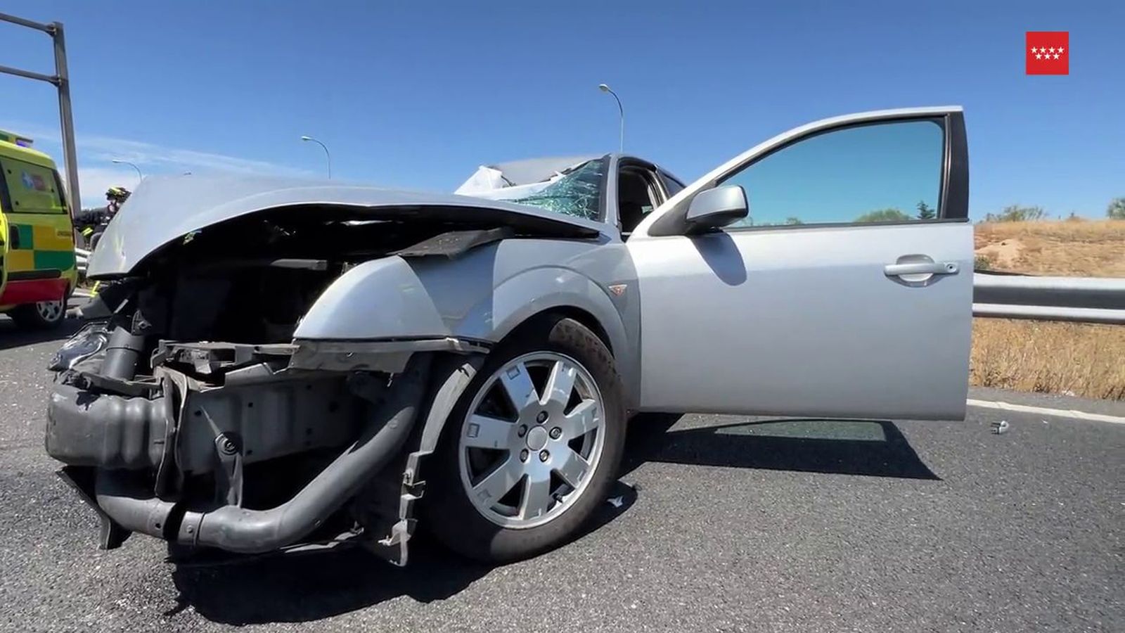 accidente entre un coche y una grúa en la M-40