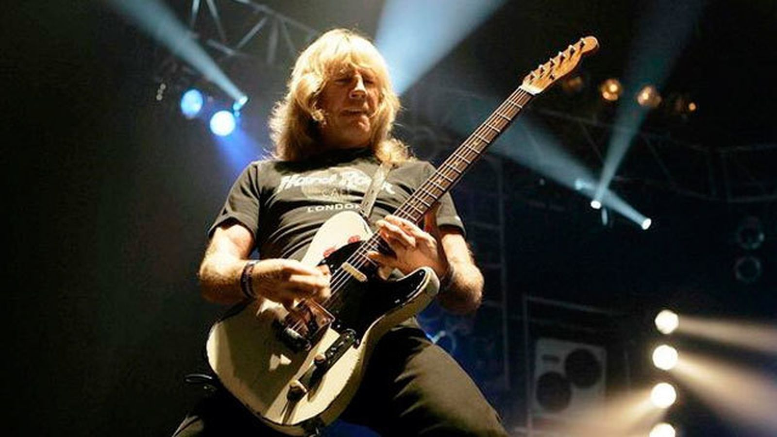 Rick Parfitt durante un concierto