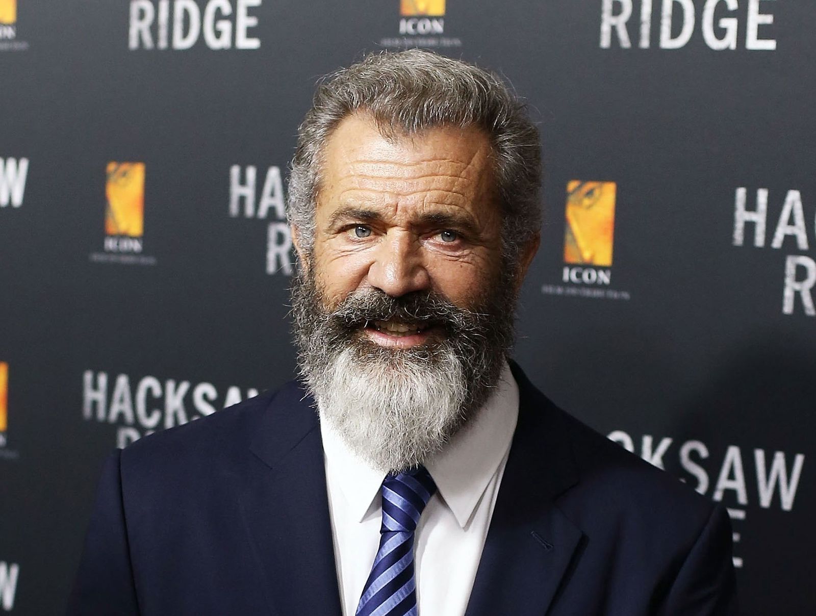 Mel Gibson hace mutis por el foro cuando le preguntan por el tortazo de Will Smith