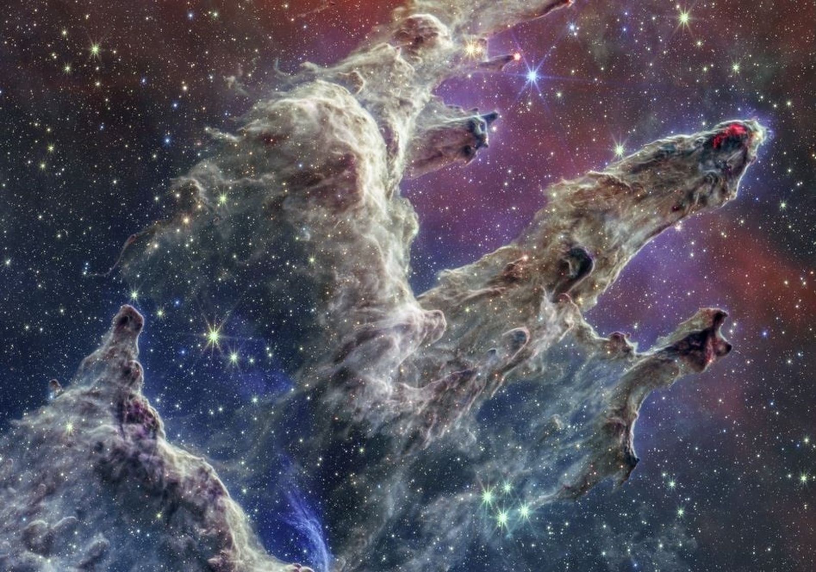 Zarcillos de polvo y gas cósmicos en el corazón de M16, o nebulosa del Águila