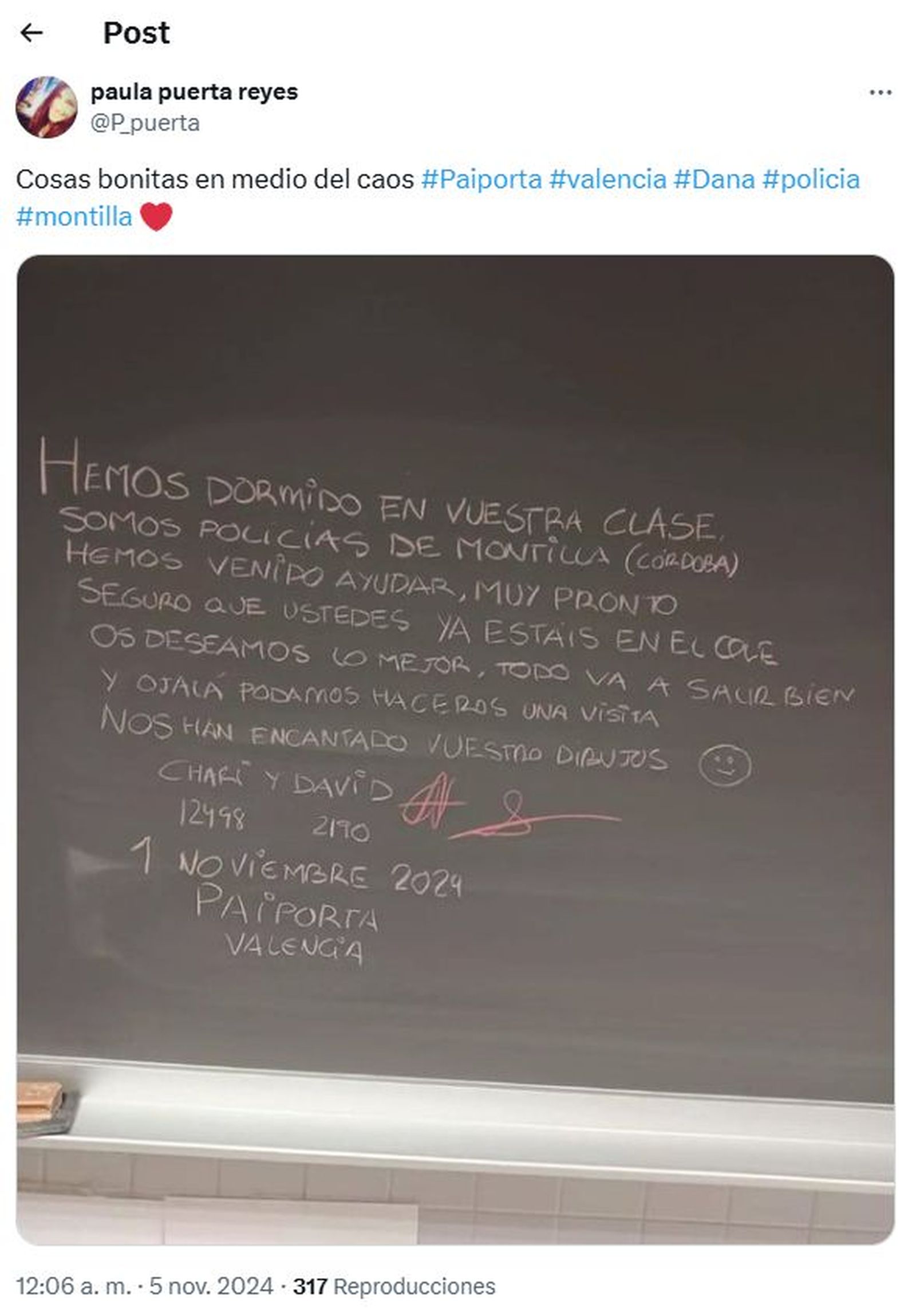 Mensaje de una usuaria en Twitter enseñando el bonito mensaje de dos policías de Granada para los afectados por la DANA