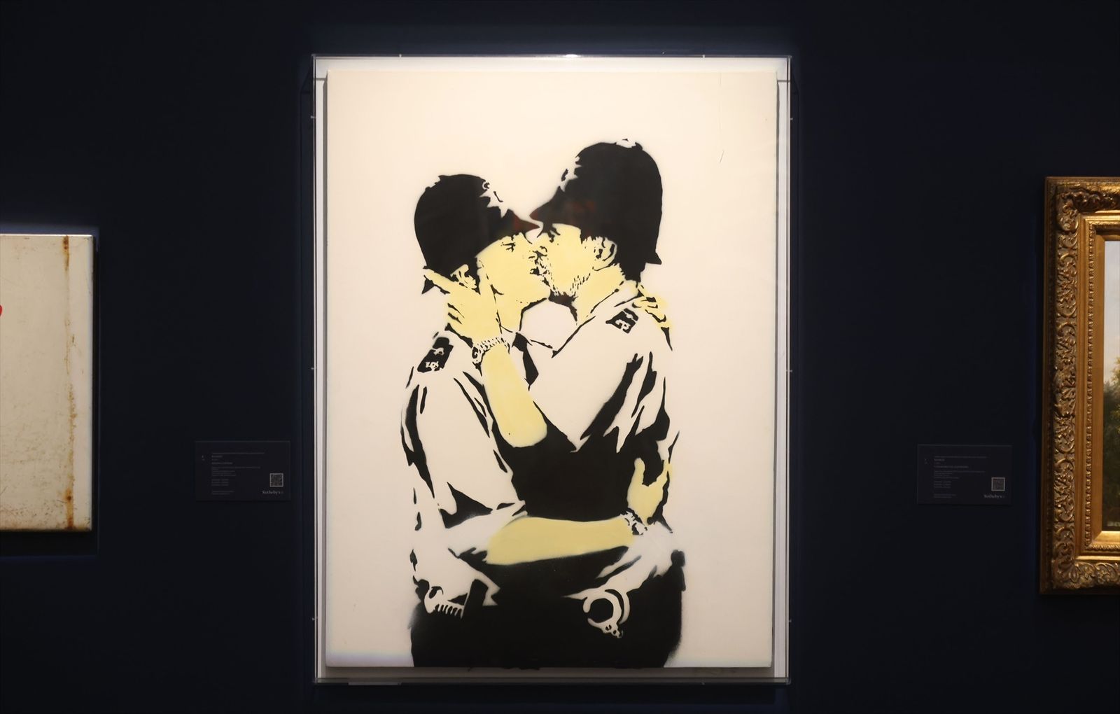 Obra de Bansky 'Kissing Coppers'