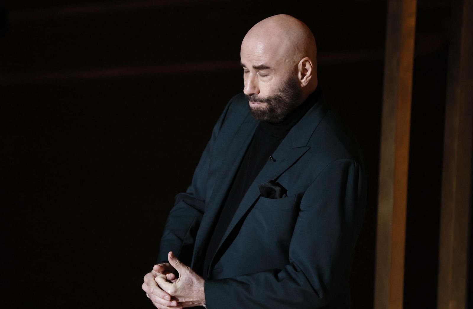 John Travolta emocionado en la presentación de "In Memoriam"