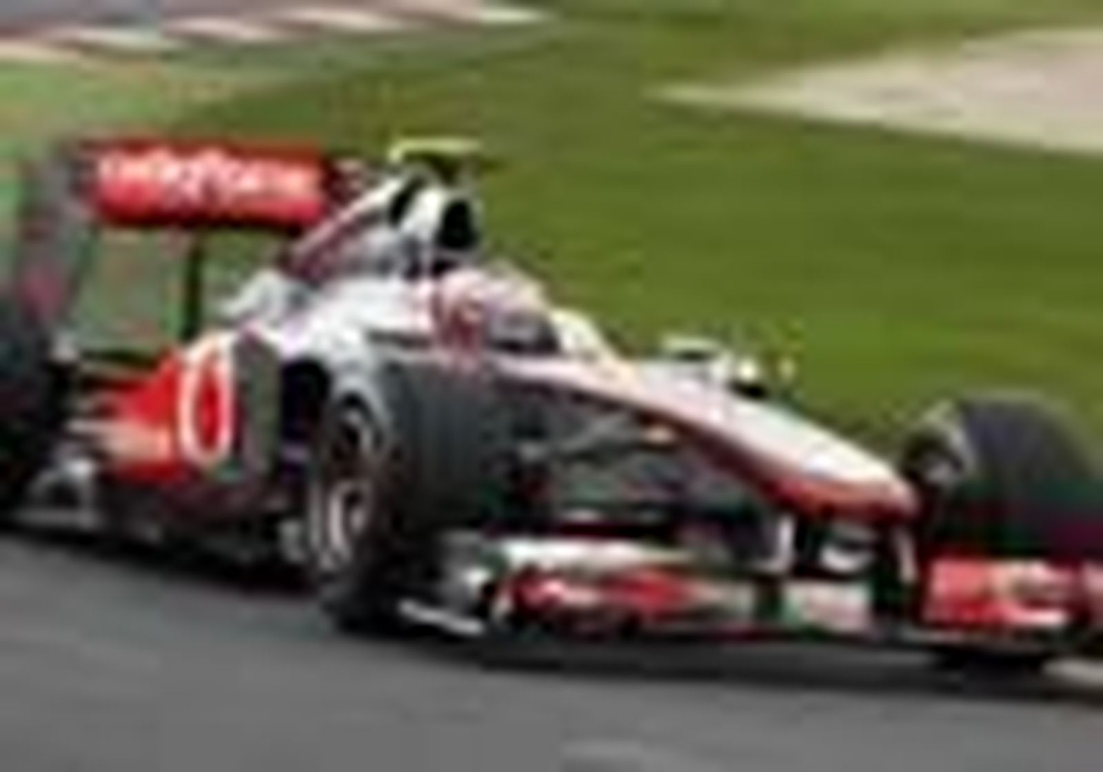 Button lidera el doblete de McLaren, con Alonso tercero