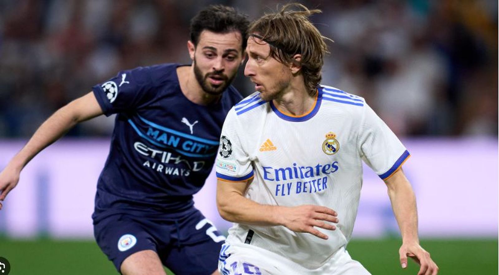 Modric ante Bernardo Silva