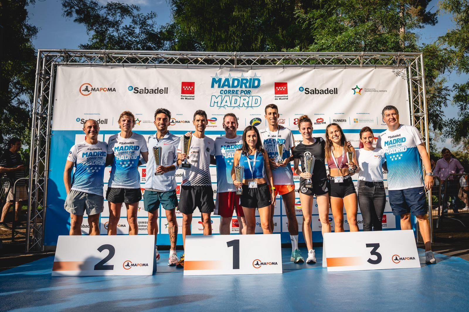 Podio masculino y femenino de la carrera Madrid corre por Madrid