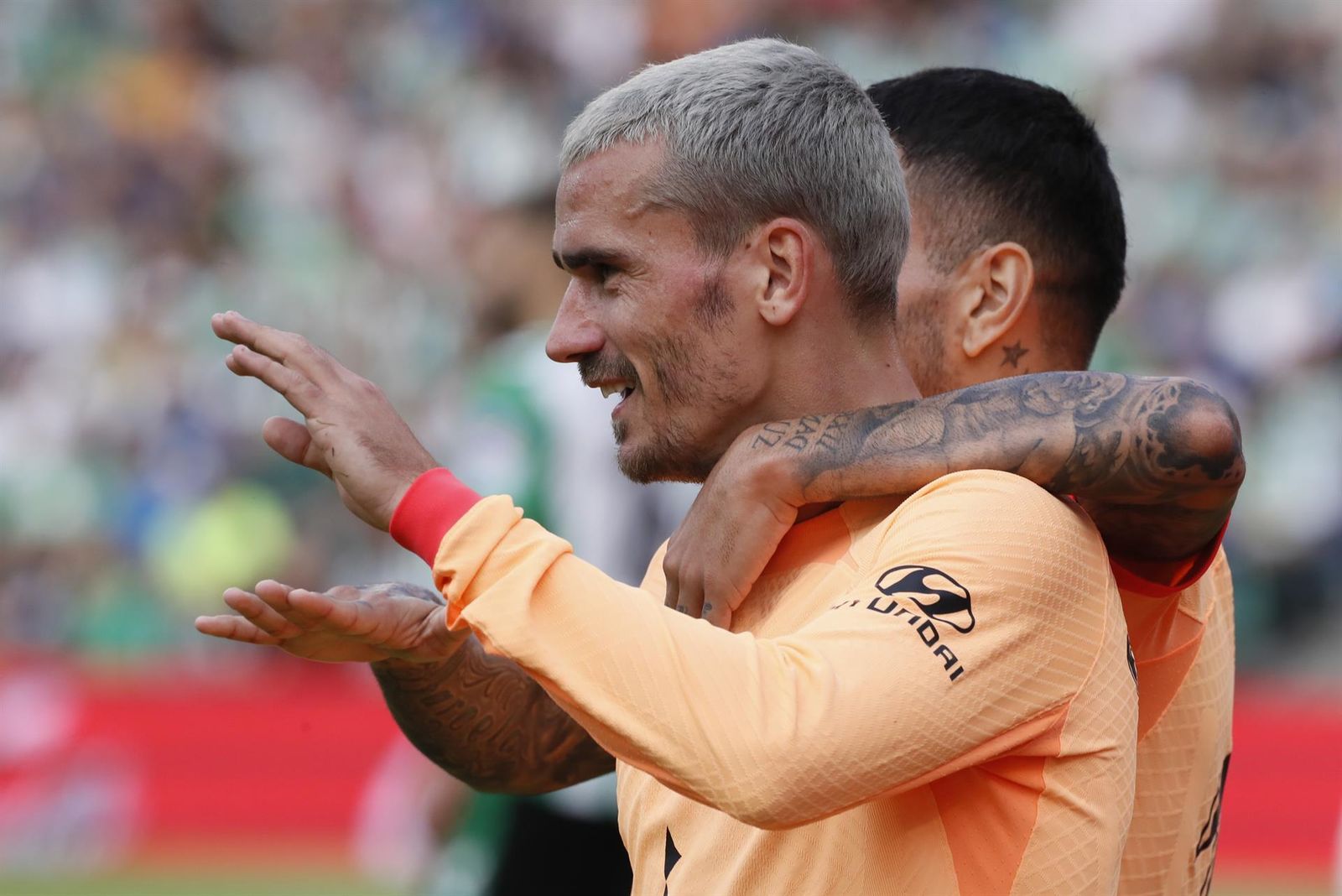 Griezmann celebra tras anotar un gol durante el encuentro entre el Betis y el Atlético