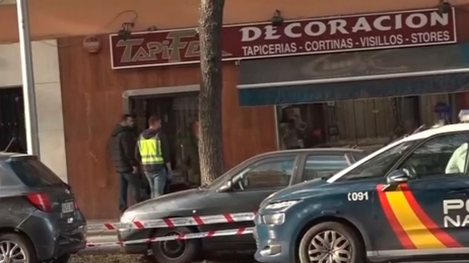 Tapicería de Latina donde fue encontrado el dueño asesinado