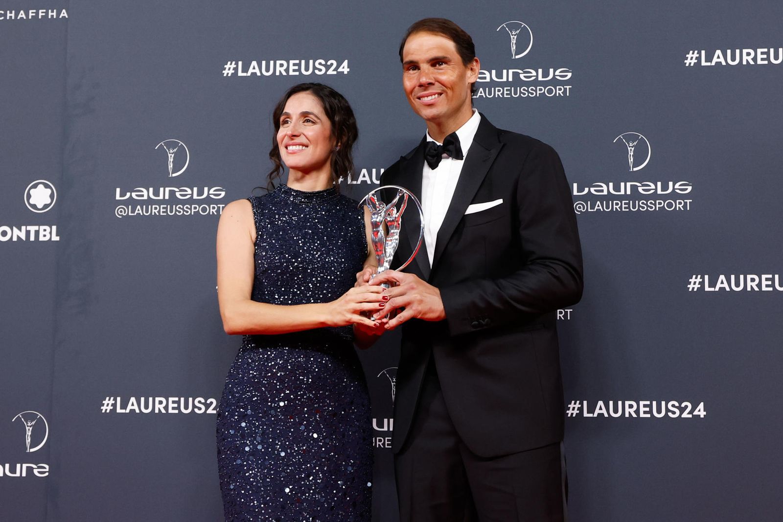 Rafa Nadal junto a su mujer