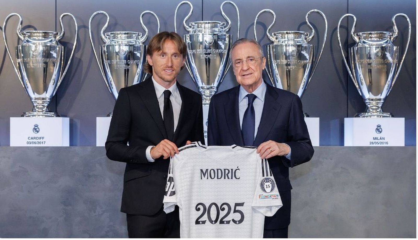 Luka Modric y Florentino Pérez
