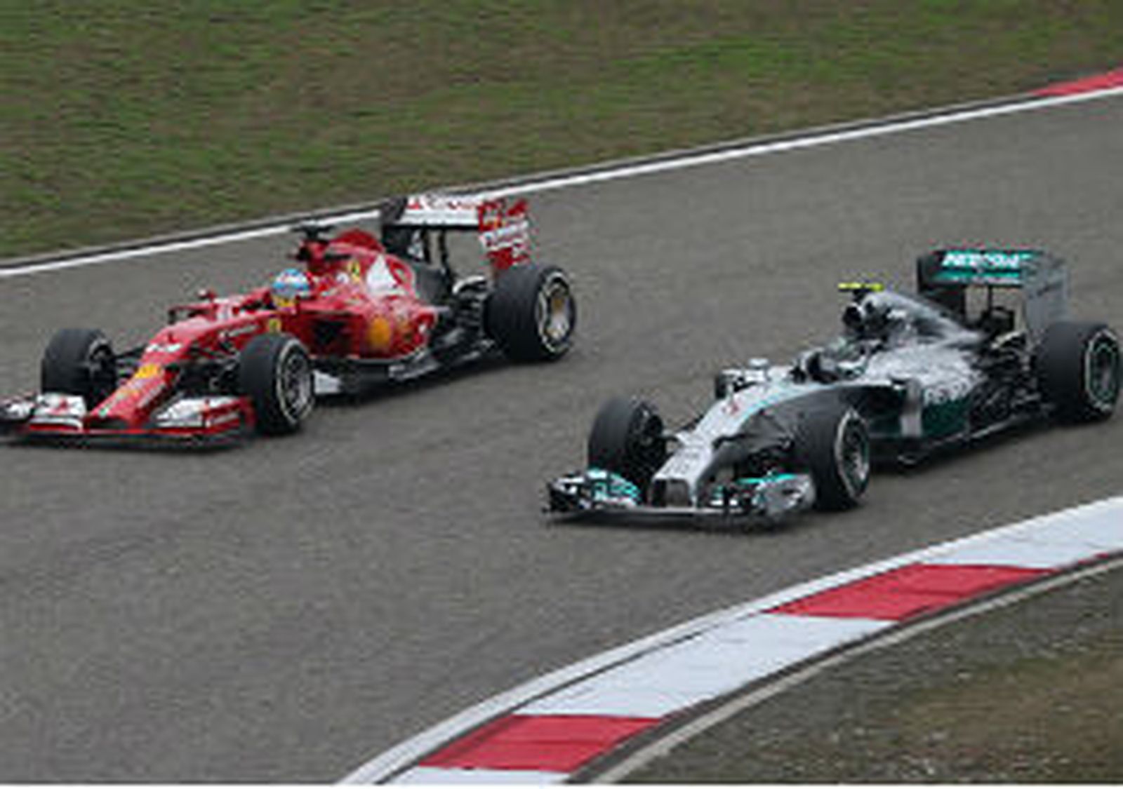 Fernando Alonso y Nico Rosberg