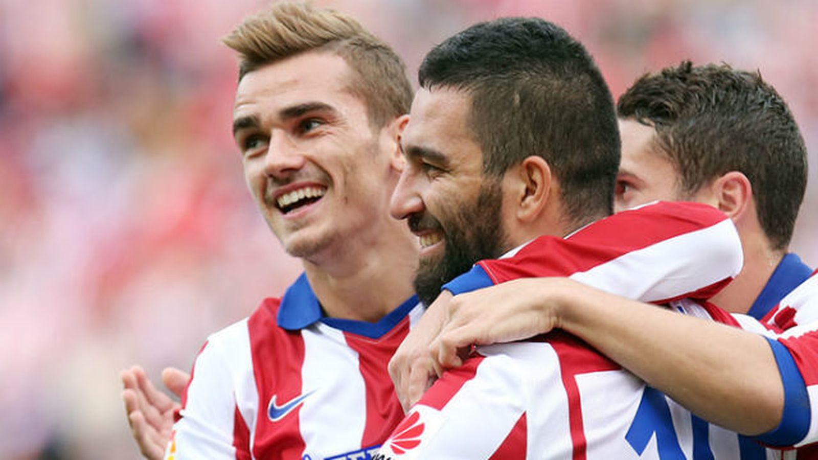 Griezmann y Arda Turan