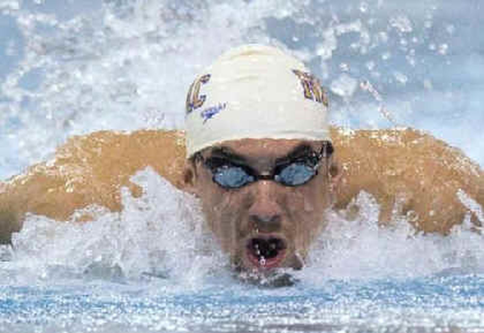 Phelps gana su primera medalla en Shanghái, una de bronce, en el 4x100