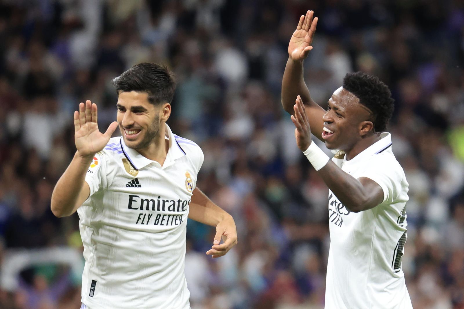 Marco Asensio y Vinicius