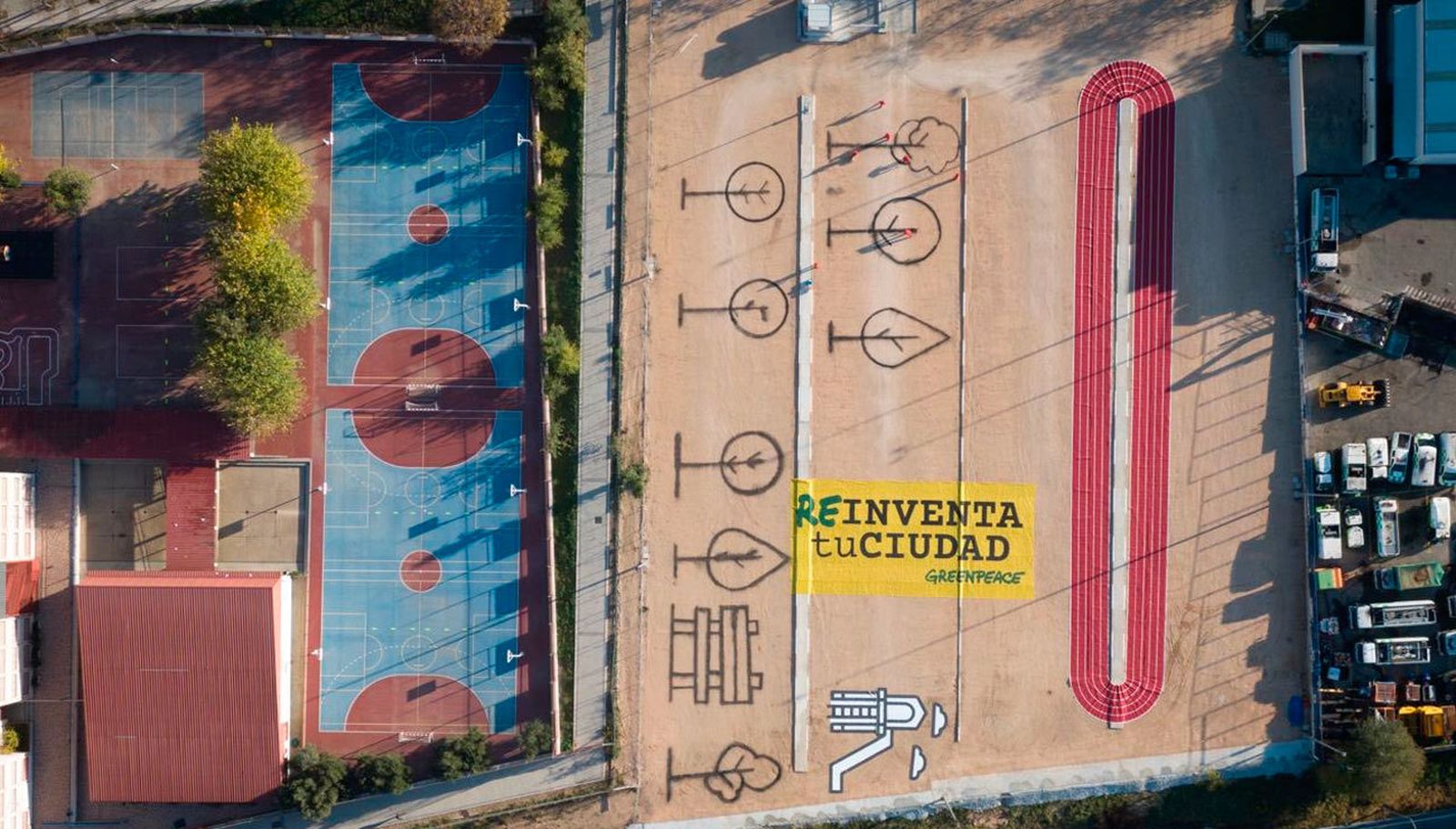 Greenpeace transforma un aparcamiento en Hortaleza  en una pista de atletismo
