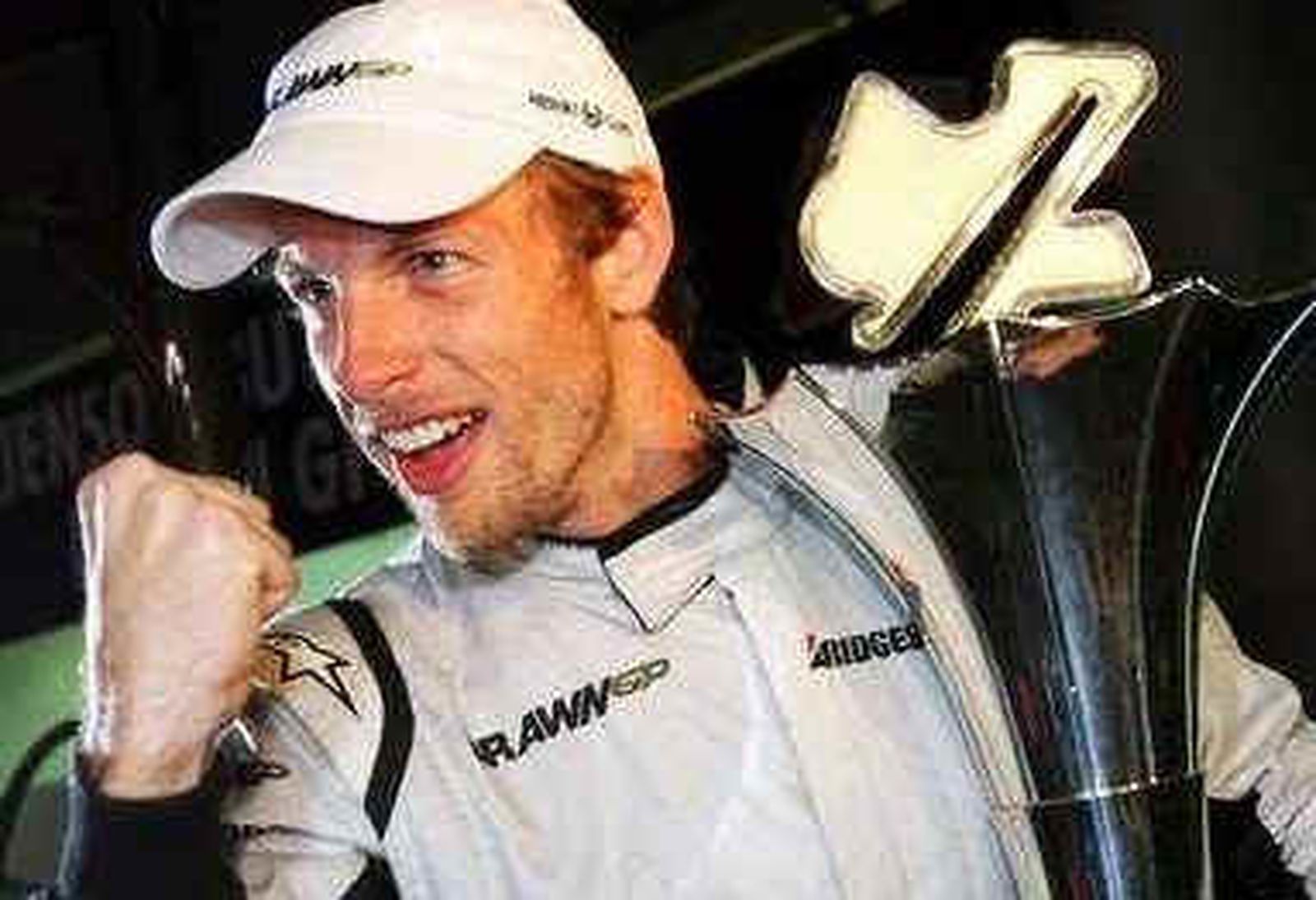 Button (McLaren) se lleva la victoria por delante de Vettel (Red Bull) y Alonso (Ferrari)